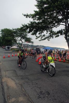 Mattapoisett Lions Club Triathlon
Emily Tato was grateful to Aner Larreategi after their top-three-overall performances in Sunday’s Mattapoisett Lions Club Triathlon. Pushed from start to finish by Larreategi, Tato was the fastest woman in all three events, the swim, bike and run. Don Cuddy was the 70-and-over winner. Photos by Mick Colageo
