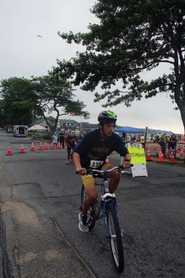 Mattapoisett Lions Club Triathlon
Emily Tato was grateful to Aner Larreategi after their top-three-overall performances in Sunday’s Mattapoisett Lions Club Triathlon. Pushed from start to finish by Larreategi, Tato was the fastest woman in all three events, the swim, bike and run. Don Cuddy was the 70-and-over winner. Photos by Mick Colageo
