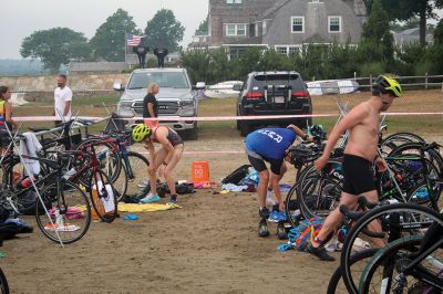 Mattapoisett Lions Club Triathlon
Emily Tato was grateful to Aner Larreategi after their top-three-overall performances in Sunday’s Mattapoisett Lions Club Triathlon. Pushed from start to finish by Larreategi, Tato was the fastest woman in all three events, the swim, bike and run. Don Cuddy was the 70-and-over winner. Photos by Mick Colageo
