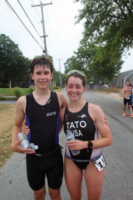 Mattapoisett Lions Club Triathlon
Emily Tato was grateful to Aner Larreategi after their top-three-overall performances in Sunday’s Mattapoisett Lions Club Triathlon. Pushed from start to finish by Larreategi, Tato was the fastest woman in all three events, the swim, bike and run. Don Cuddy was the 70-and-over winner. Photos by Mick Colageo
