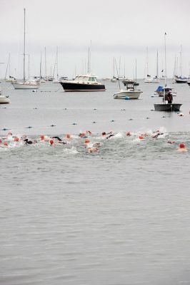 Triathlon
The Triathlon kicked off the first of the many Harbor Days events scheduled over the week and into the weekend. Hosted by the Mattapoisett Lions Club every year, the triathlon takes racers .25 miles from the shore of Town Beach and back, 10 miles bicycling through Mattapoisett, and 5K through the village around Ned’s Point Lighthouse. Photos by Colin Veitch
