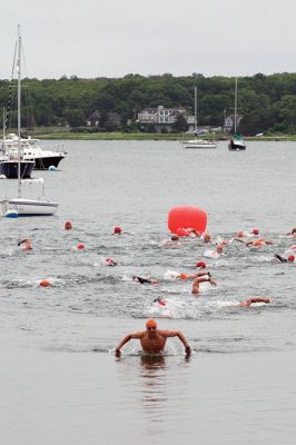 Triathlon
The Triathlon kicked off the first of the many Harbor Days events scheduled over the week and into the weekend. Hosted by the Mattapoisett Lions Club every year, the triathlon takes racers .25 miles from the shore of Town Beach and back, 10 miles bicycling through Mattapoisett, and 5K through the village around Ned’s Point Lighthouse. Photos by Colin Veitch
