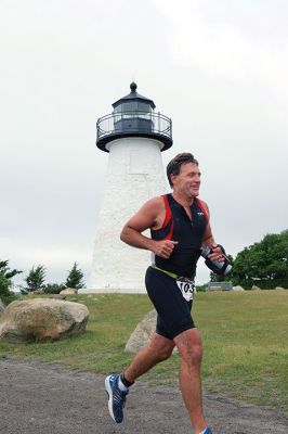 Triathlon
The Triathlon kicked off the first of the many Harbor Days events scheduled over the week and into the weekend. Hosted by the Mattapoisett Lions Club every year, the triathlon takes racers .25 miles from the shore of Town Beach and back, 10 miles bicycling through Mattapoisett, and 5K through the village around Ned’s Point Lighthouse. Photos by Colin Veitch
