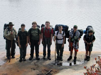 Marion Boy Scouts
The Scouts of Troop 32 Marion Boy Scouts went on a backpacking and camping trip on October 4 and 5 at Camp Yawgoog in Hopkington, Rhode Island. With all of their gear on their backs, the Scouts hiked five miles, including a long leg that went around Yawgoog Pond. This included setting up camp at two different locations for two different nights: Sherwood Forest and Hidden Lake. The Scouts are (l-r): Paul St. Don (Scoutmaster), Jack Nakashian, Dave Sheldon, Doug Breault Jr., Ben Lima, Zachary Pateakos, and Ja

