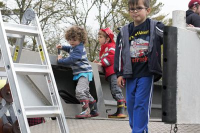 Kids Equipment Fun Day
Saturday, May 7, was the date for the annual Kids Equipment Fun Day at Washburn Park in Marion, sponsored by Marion Recreation. The kids climbed aboard ambulances, fire trucks, police cruisers, and even the harbormaster’s boat. This year, Recreation Director and Selectman Jody Dickerson served up free hotdogs during the popular event that seemed to draw a bigger crowd this year than the previous years. Photos by Ethan Akins
