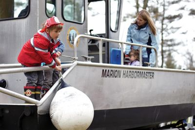 Kids Equipment Fun Day
Saturday, May 7, was the date for the annual Kids Equipment Fun Day at Washburn Park in Marion, sponsored by Marion Recreation. The kids climbed aboard ambulances, fire trucks, police cruisers, and even the harbormaster’s boat. This year, Recreation Director and Selectman Jody Dickerson served up free hotdogs during the popular event that seemed to draw a bigger crowd this year than the previous years. Photos by Ethan Akins
