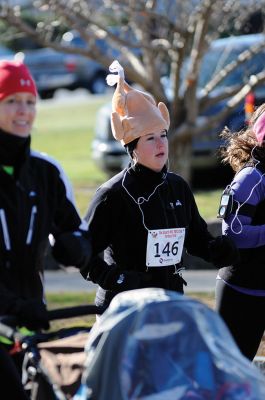 Marion Turkey Trot
It was a cold start, race, and finish for the Marion Recreation Annual Turkey trot this Sunday but spirits were high. Matt Sylvain of Dartmouth took top honors for the men with a time of 18:33 and Allison Rossi for the Women with a time of 21:02. Photos by Felix Perez
