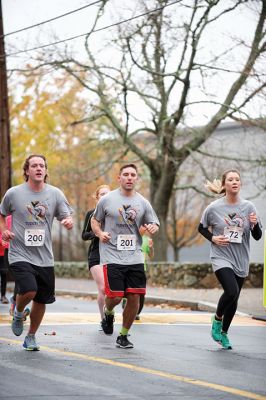 5th Annual 5K Turkey Trot
There were 31 registered runners for this year’s 5th Annual 5K Turkey Trot for Marion Recreation on Sunday, November 22. The course takes runners from Tabor Academy down Front Street through the village and back again to Tabor. Adam Sylvia of Rochester took first place for men, and Julie Craig of Mattapoisett took first place for women. Photos by Colin Veitch
