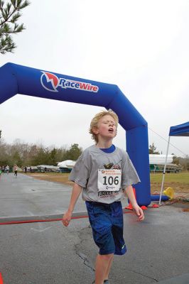 5th Annual 5K Turkey Trot
There were 31 registered runners for this year’s 5th Annual 5K Turkey Trot for Marion Recreation on Sunday, November 22. The course takes runners from Tabor Academy down Front Street through the village and back again to Tabor. Adam Sylvia of Rochester took first place for men, and Julie Craig of Mattapoisett took first place for women. Photos by Colin Veitch
