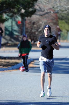 Marion Turkey Trot
It was a cold start, race, and finish for the Marion Recreation Annual Turkey trot this Sunday but spirits were high. Matt Sylvain of Dartmouth took top honors for the men with a time of 18:33 and Allison Rossi for the Women with a time of 21:02. Photos by Felix Perez
