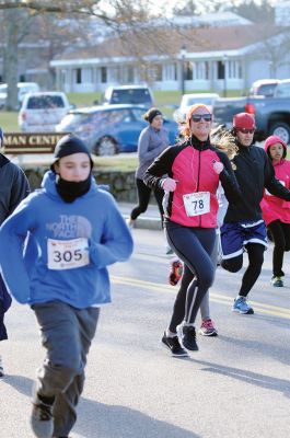 Marion Turkey Trot
It was a cold start, race, and finish for the Marion Recreation Annual Turkey trot this Sunday but spirits were high. Matt Sylvain of Dartmouth took top honors for the men with a time of 18:33 and Allison Rossi for the Women with a time of 21:02. Photos by Felix Perez
