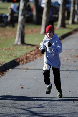 Marion Turkey Trot
It was a cold start, race, and finish for the Marion Recreation Annual Turkey trot this Sunday but spirits were high. Matt Sylvain of Dartmouth took top honors for the men with a time of 18:33 and Allison Rossi for the Women with a time of 21:02. Photos by Felix Perez
