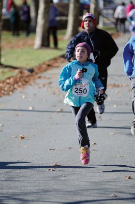 Marion Turkey Trot
It was a cold start, race, and finish for the Marion Recreation Annual Turkey trot this Sunday but spirits were high. Matt Sylvain of Dartmouth took top honors for the men with a time of 18:33 and Allison Rossi for the Women with a time of 21:02. Photos by Felix Perez
