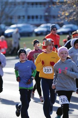 Marion Turkey Trot
It was a cold start, race, and finish for the Marion Recreation Annual Turkey trot this Sunday but spirits were high. Matt Sylvain of Dartmouth took top honors for the men with a time of 18:33 and Allison Rossi for the Women with a time of 21:02. Photos by Felix Perez
