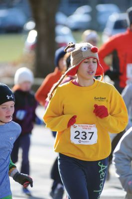 Marion Turkey Trot
It was a cold start, race, and finish for the Marion Recreation Annual Turkey trot this Sunday but spirits were high. Matt Sylvain of Dartmouth took top honors for the men with a time of 18:33 and Allison Rossi for the Women with a time of 21:02. Photos by Felix Perez
