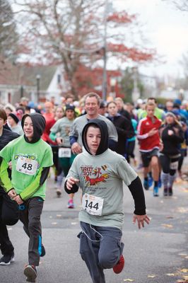 Annual Turkey Trot 5K 
The Annual Turkey Trot 5K wound its way through Marion Village on Sunday, November 17, with 182 trotters (and some ‘turkeys’ as well) braving a chilling wind that morning to make it to the finish line. Organized by the Marion Recreation Department, the event every year draws quite a flock of runners to the start and finish line at Tabor Academy, raising funds for Marion Rec programs and events. Photos by Colin Veitch
