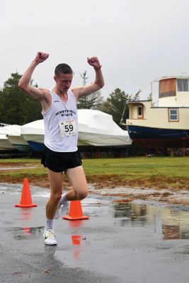 Turkey Trot 5K 
Sunday was the morning of the annual Turkey Trot 5K in the center of Marion. Yes, it was rainy and windy, but the 80 turkeys (we mean participants) that showed up anyway still enjoyed the scenic village trot. Photos by Glenn C. Silva
