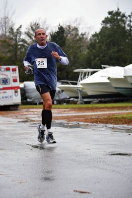 Turkey Trot 5K 
Sunday was the morning of the annual Turkey Trot 5K in the center of Marion. Yes, it was rainy and windy, but the 80 turkeys (we mean participants) that showed up anyway still enjoyed the scenic village trot. Photos by Glenn C. Silva
