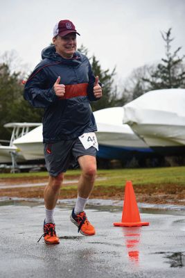 Turkey Trot 5K 
Sunday was the morning of the annual Turkey Trot 5K in the center of Marion. Yes, it was rainy and windy, but the 80 turkeys (we mean participants) that showed up anyway still enjoyed the scenic village trot. Photos by Glenn C. Silva
