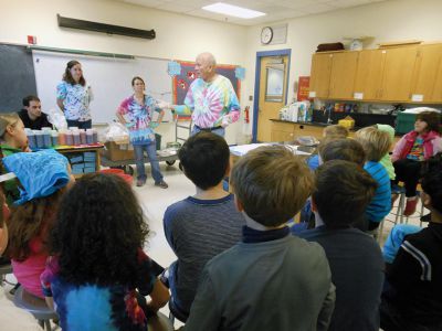 Tie Dye Fun
Students at the Marion Natural History After School Program learned about chemical reactions and colors during a tie-dye shirt-making session held this past week with UMass Dartmouth Chemistry Professor Tobey Dills. Photo courtesy of Elizabeth Leidhold
