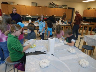 Tie Dye Fun
Students at the Marion Natural History After School Program learned about chemical reactions and colors during a tie-dye shirt-making session held this past week with UMass Dartmouth Chemistry Professor Tobey Dills. Photo courtesy of Elizabeth Leidhold
