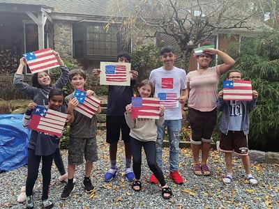 Veterans Day Flags 
Deanna Vieira’s family created these fabulous Veterans Day flags and shared them with their neighbors to celebrate their service.
