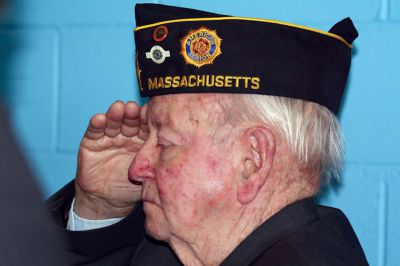 Veteran’s Day 
On November 12, members of the Mattapoisett community gathered together at Old Hammondtown Elementary School for their annual Veteran’s Day ceremony.  Commander Michael Lamoureux served as emcee of the event while State Representative William Straus, Selectman Paul Silva, Veterans’ Agent Barry Denham and U.S. Navy Lieutenant Scott Burrill addressed the audience.  The school’s chorus and band played patriotic tunes while the Mattapoisett Police Department presented the colors.  Photos by Katy Fitzpatrick
