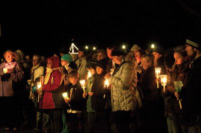 Candle Light Vigil
Hundreds of people from around Mattapoisett gathered at Shipyard Park on Wednesday, December 19, for a candle light vigil to remember the victims and families of the Newtown, Conn. elementary school shooting.  The service featured prayers by local clergy and music by local youth singing group, The Showstoppers.  Photo by Eric Tripoli.  
