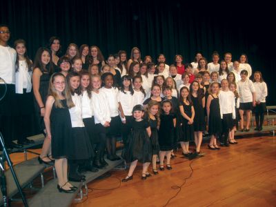 Voices in Time
On Monday, April 5, 2010 the North Side Singers kids vocal troupe and the Tri-Town community vocal troupe Voices in Time presented a collaborative concert at Dartmouth High School. Both groups presented a venue of nostalgic and memorable songs from the past and present. All proceeds benefited the North Side Singers who will perform in Washington later this month. Photo courtesy of Sharon Jensen.
