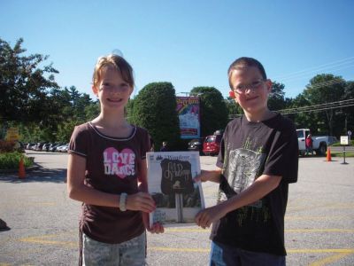 Storyland
Twins Mikayla and Zechariah Mooney hold up a copy of the Wanderer while on vacation at Storyland. Picture submitted by Judy Mooney.
