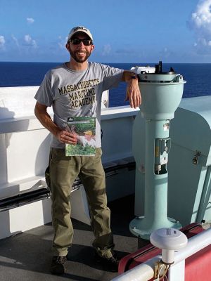 Perla Del Caribe
Chief Mate Doug Voss of Mattapoisett in the North Atlantic onboard the cargo ship "Perla Del Caribe" running south from Jacksonville, Florida, to San Juan, Puerto Rico, on July 31. “I was so excited that my parents sent me a copy of The Wanderer. They paid $8 in postage to ensure it arrived on time!” Voss attended Massachusetts Maritime Academy and is deployed for three months in the U.S. Merchant Marines on a cargo ship bringing 1,000 containers loaded with supplies
