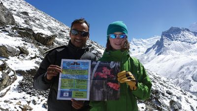 Everest Base Camp 
Megan Iverson, age 13 just completed a fifteen-day trek in the Himalaya Mountains of Nepal to the Everest Base Camp with her family.  She reached an elevation of 18,220 feet and covered over 85 miles on the trek. Megan is a resident of Marion and a student at Falmouth Academy. In the photo is Megan and her Nepal guide Suman.
