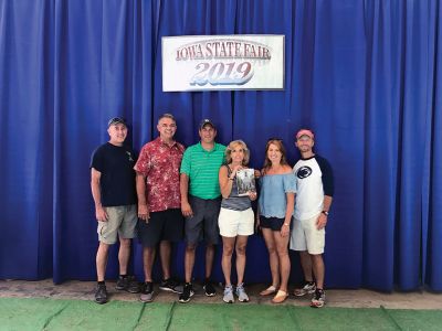 Iowa State Fair
At the Iowa State Fair with The Wanderer! L-R: Gary Sanderson of Florida, Don Woodruff of Iowa, Jeff and Melanie Perry of Rochester, and Amy and Jim Daly of New York. Photo courtesy Melanie Perry
