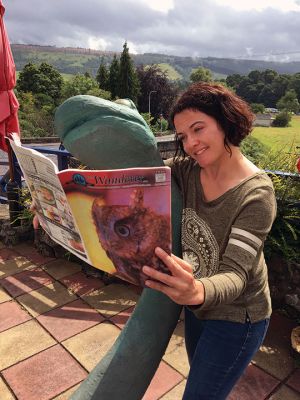 Scotland
While visiting Scotland this July, Wanderer News Editor Jean Perry stopped by famous Loch Ness while traveling to the Scottish Highlands. Finding it inundated with tourists holding selfie sticks, she sought out a quiet spot where she found Nessie hiding from the crowds and bonded over a recent copy of The Wanderer.
