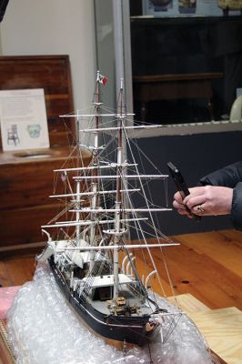 Whale Bark Wanderer
Mattapoisett Museum Curator Connor Gaudet and volunteer Bob Clifford unpack the custom model of the Whale Bark Wanderer 1878 recreated by artist George Lowery from scratch and donated to the museum. The model arrived on Tuesday afternoon from Arizona in a crate weighing a total of 181 pounds. The model joins two other models of the famous whaling ship in the museum, including a model built and donated by John D. Young. Photos by Mick Colageo
