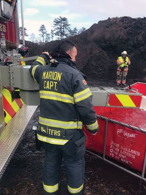 Tri-Town firefighters
The holidays were challenging for Tri-Town firefighters. Marion and Rochester fire departments were among towns assisting Wareham after a mulch pile in a remote location off County Road caught fire on Christmas Eve. Firefighters worked in cold temperatures for eight hours, dispensing approximately 200,000 gallons of water to extinguish the fire. Seen supporting Wareham Fire Chief John Kelley and 29 Wareham Fire personnel at the scene were Marion Fire Tanker 1, Lieutenant Michael Still and Captain Joel Watte
