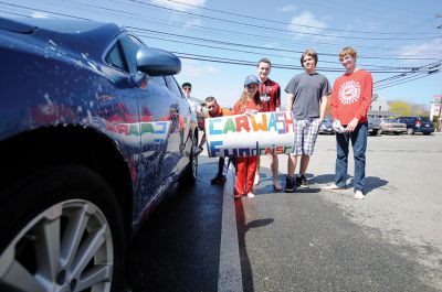 G.E.E.K. Carwash
Members of Old Rochester Regional Junior High School’s G.E.E.K. (Great Educated Entertaining Kids) team hosted a car wash at the Mattapoisett Fire House to raise funds for their trip to the Destination Imagination Global Finals in Knoxville, Tenn. Photo by Felix Perez.
