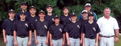 League Champs
The White Sox won the Old Rochester Little League Championship with a record of 16-5. The team from left to right in the back row: Jared Gammell, Coach Salkind, Grant Reuter, Bryant Salkind, Pierre Thibdeau, Andrew Riggi, Coach Reuter. Front row, left to right: Chris Horton, Patrick Cummings, BradyCosta, Zach Kelley, Jacob Lawrence, CoachCummings. Not pictured: Cory Lunn. Photo courtesy of Rob Reuter.
