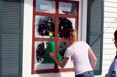 Holiday Windows
Art students from Old Rochester Regional High School work under Ms. Dorothy's guidance to decorate Plumb Corner storefront windows on November 17, 2009. The students took a couple hours away from books to enjoy some paint and sunshine. The festive windows will be on display until Christmas. Photo by Anne O'Brien-Kakley.
