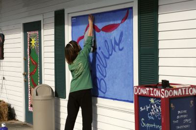 Holiday Windows
Art students from Old Rochester Regional High School work under Ms. Dorothy's guidance to decorate Plumb Corner storefront windows on November 17, 2009. The students took a couple hours away from books to enjoy some paint and sunshine. The festive windows will be on display until Christmas. Photo by Anne O'Brien-Kakley.
