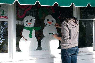 Holiday Windows
Art students from Old Rochester Regional High School work under Ms. Dorothy's guidance to decorate Plumb Corner storefront windows on November 17, 2009. The students took a couple hours away from books to enjoy some paint and sunshine. The festive windows will be on display until Christmas. Photo by Anne O'Brien-Kakley.
