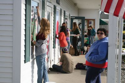 Holiday Windows
Art students from Old Rochester Regional High School work under Ms. Dorothy's guidance to decorate Plumb Corner storefront windows on November 17, 2009. The students took a couple hours away from books to enjoy some paint and sunshine. The festive windows will be on display until Christmas. Photo by Anne O'Brien-Kakley.
