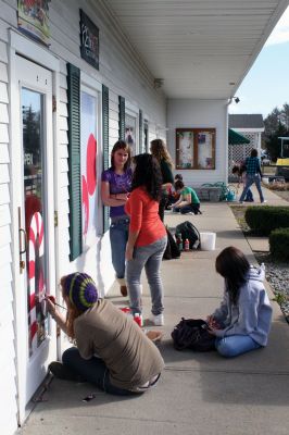 Holiday Windows
Art students from Old Rochester Regional High School work under Ms. Dorothy's guidance to decorate Plumb Corner storefront windows on November 17, 2009. The students took a couple hours away from books to enjoy some paint and sunshine. The festive windows will be on display until Christmas. Photo by Anne O'Brien-Kakley.
