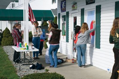 Holiday Windows
Art students from Old Rochester Regional High School work under Ms. Dorothy's guidance to decorate Plumb Corner storefront windows on November 17, 2009. The students took a couple hours away from books to enjoy some paint and sunshine. The festive windows will be on display until Christmas. Photo by Anne O'Brien-Kakley.
