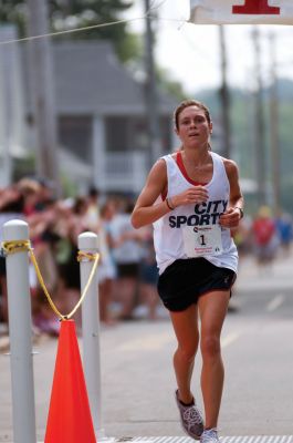 Top Runner
21-year-old Alice Binns of Boston, MA, crossed the finish line of the 2011 Mattapoisett Road Race with a time of 31:38, making her the Women's winner. Photo by Felix Perez.
