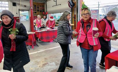 Mattapoisett Woman's Club
Inclement weather forced the Mattapoisett Woman's Club to move its Holidays Wreath and Greens Sale indoors, and the club was thrilled that the December 3 event, with the assistance of MWC members Cindy Turse and Sandy Hering, Fire Chief Andy Murray and Town Administrator Mike Lorenco, was able to go on as scheduled in the Old Firehouse on Route 6. Wreaths sold out within the first hour of the sale, with swags, table pieces, box designs and special ornaments, all exquisitely hand-decorated 
