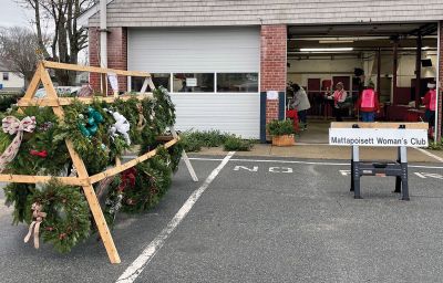 Mattapoisett Woman's Club
Inclement weather forced the Mattapoisett Woman's Club to move its Holidays Wreath and Greens Sale indoors, and the club was thrilled that the December 3 event, with the assistance of MWC members Cindy Turse and Sandy Hering, Fire Chief Andy Murray and Town Administrator Mike Lorenco, was able to go on as scheduled in the Old Firehouse on Route 6. Wreaths sold out within the first hour of the sale, with swags, table pieces, box designs and special ornaments, all exquisitely hand-decorated 
