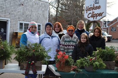 Sole Survivors Fundraiser
It’s beginning to look a lot like Christmas! Members of the Tri-Town Walk for Life team “Sole Survivors” kicked off their Christmas wreath fundraiser on Friday, November 28. The team will be stationed out in front of Al’s Yankee Clipper on Route 6 in Marion for the next two weekends to raise money for the American Cancer Society. Photos by Jean Perry
