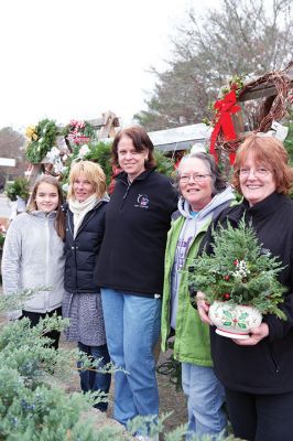 Christmas Wreath Sale 
Team “Sole Survivor” held its annual Christmas wreath sale last weekend beginning on Black Friday, and they will continue to sell hand-decorated wreaths and crafts throughout this weekend while supplies last. The group is stationed out front of 428 Wareham Road (Route 6) in Marion. All proceeds benefit the Tri-Town Relay for Life. Photos by Colin Veitch
