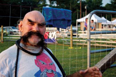 Rochester Wrestling
Former wrestling super star Ox Baker was on hand to sign autographs and meet fans during the Rochester Country Fair's wrestling contest on Friday, August 17, 2012.  The show featured local and regional performers in a variety of formats, from singles fights to tag-team.  Photo by Eric Tripoli.
